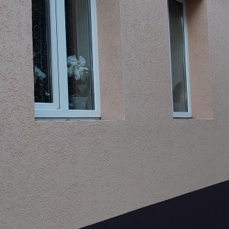 Устройство "Мокрого фасада"  с покрытием короед частного дома в Воронеже