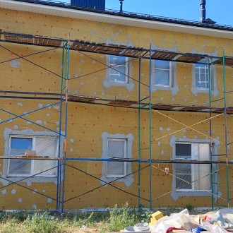 Устройство "Мокрого фасада" с утеплением частного дома в Воронеже