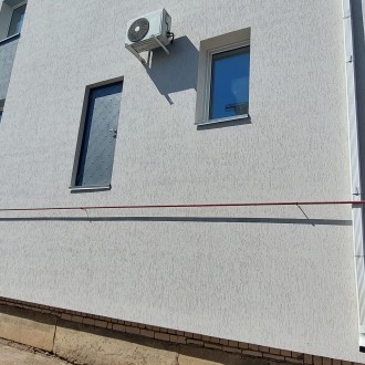 Устройство штукатурного фасада с утеплением частного дома в Воронеже