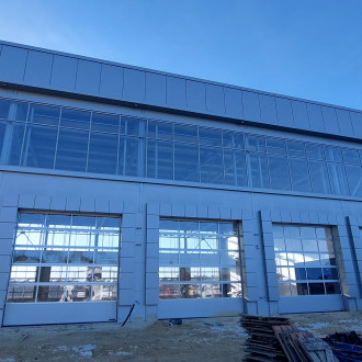 Монтаж вентилируемого фасада и алюминиевых витражей технического центра « Volvo центр» Воронеж