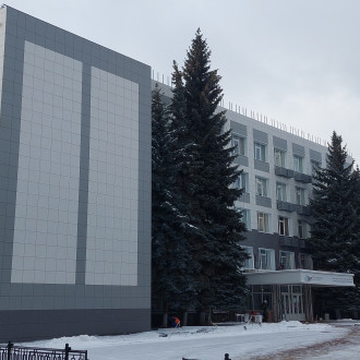 Монтаж фасада из керамогранита с утеплением здания управления Михайловский ГОК им. А.В. Варичева